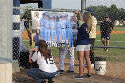 Mom’s of seniors decorating for Senior Night.