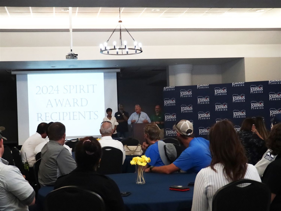 Mayor Michael Holland, Commissioner Emily Lee and Commissioner Hawkins introducing the Eustis Employee Spirit Awards