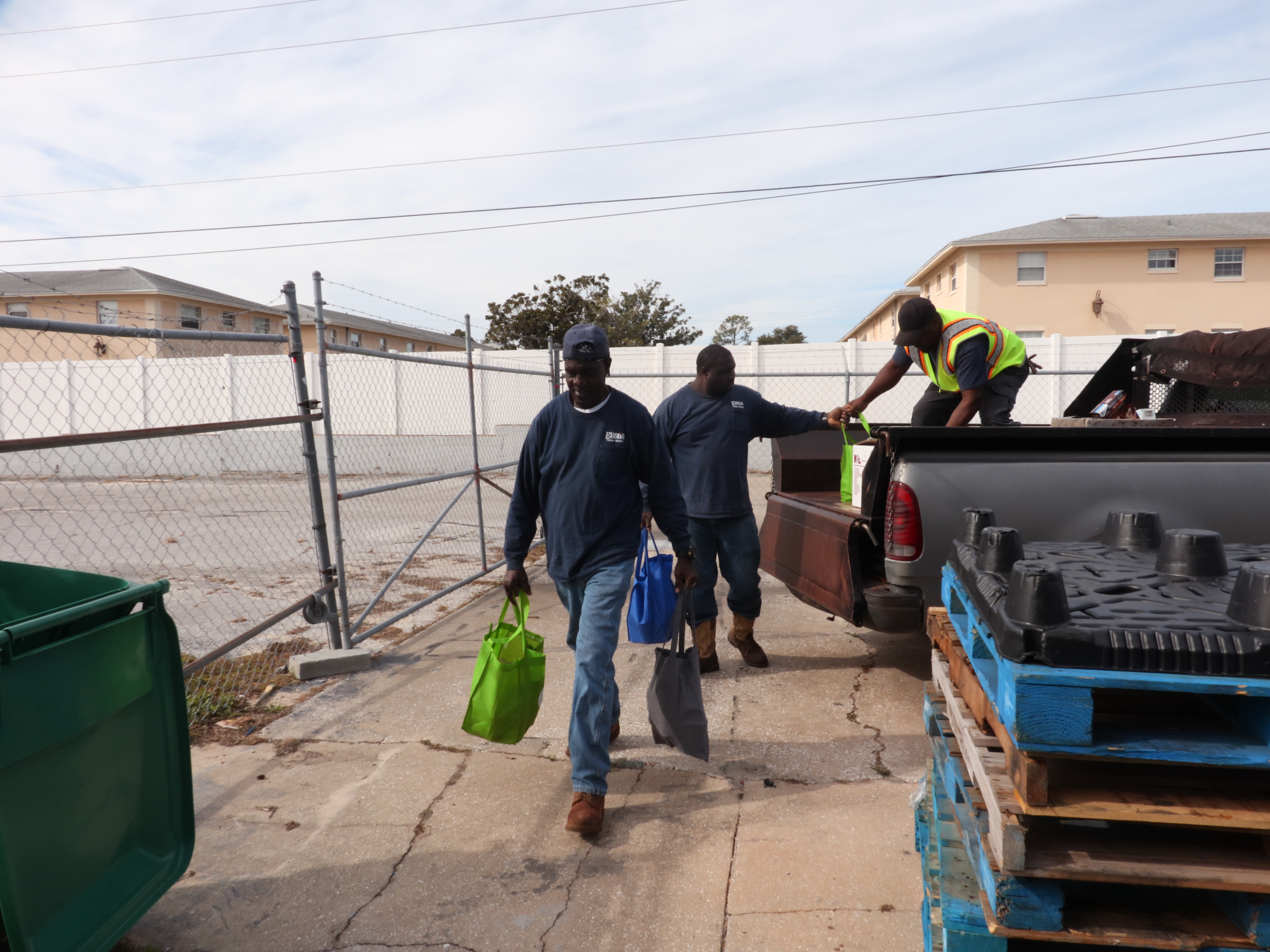 Public Works delivering bags of donations to W.I.N 1 Ministries local food pantry